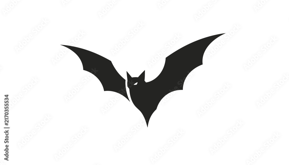 Fototapeta premium Flying black bat silhouette with outstretched wings isolated on a white background symbolizing halloween and night.