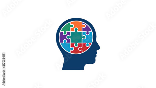 Colorful Puzzle Pieces Forming a Human Head Silhouette