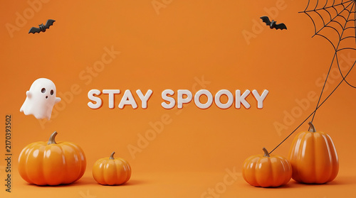 Spooky halloween pumpkins with ghost and bats on orange background
