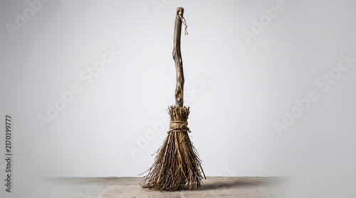 Rustic witch broom isolated on white background for Halloween decor and fantasy themes