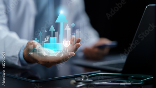 Doctor holding glowing growth arrow chart with cross and heart icons for medical healthcare investment, medical business success, insurance growth. healthcare analytics and financial growth.