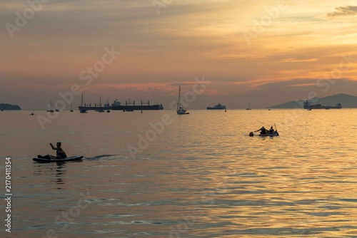 A Sunset view from Sunset Beach, Vancouver, British Columbia. Showing boats and ships in English Bay 