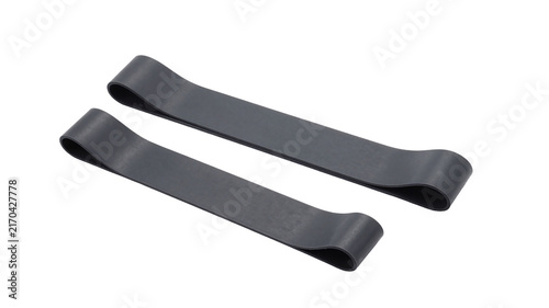 Two black resistance bands for fitness workouts and strength training on white background