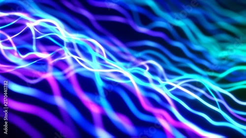 Abstract neon light trails flowing in waves on a dark background