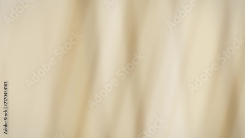 Abstract beige motion blur background. 2d animation