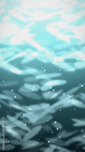 Underwater light beams and bubbles in a blue ocean. 2d animation