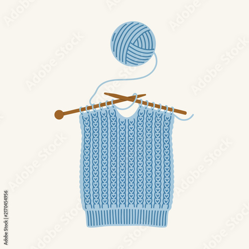 Knitting Needles With Blue Yarn And Crochet Pattern