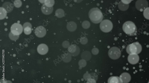Bokeh effect with soft circular lights on dark background. 2d animation