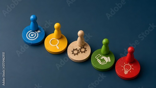 Colorful Wooden Pawns On Goal Search Process Teamwork And Innovation Discs