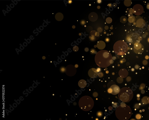 Obraz na płótnie Scattered soft golden bokeh lights against a dark background with varying sizes