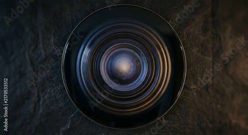 Top View of Metallic Circular Speaker Cone or Vortex on Dark Textured Slate Background