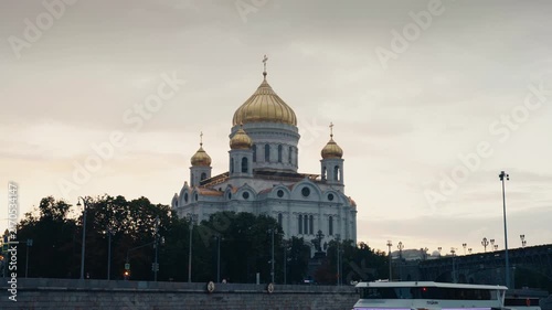 Cathedral of christ the saviour with moskva river traffic