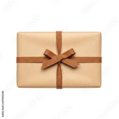 Small rectangular gift box wrapped in brown craft paper with a tied decorative ribbon isolated on transparent background