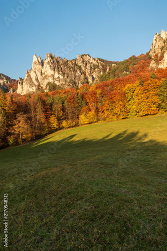 Colorful autumn Sulovske skaly above Sulov-Hradna village in Slovakia