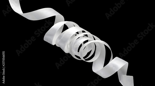 White ribbon curled spiral black background dramatic