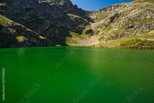 Estany de Cabana Sorda lake near Refugi de Cabana Sorda hut in Pyrenees mountains in Andorra