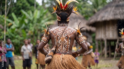 Traditional Indigenous Warrior in Ceremonial Body Paint and Feathers in Papua New Guinea Village