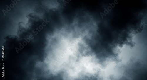 Dark storm clouds gathering in the sky before a heavy rainfall during the day