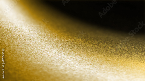 фотографія Abstract shimmering golden texture background illuminated by soft directional li