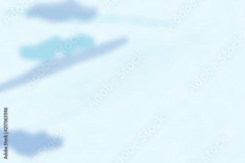 Soft blurred background, with light blue, and white tones, featuring faint cloud-like, shapes and a, gentle hazy atmosphere, for simple