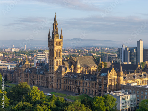 University of Glasgow historic main building and front façade in Glasgow, Scotland, showcasing elaborate Gothic Revival stonework and Victorian architecture.