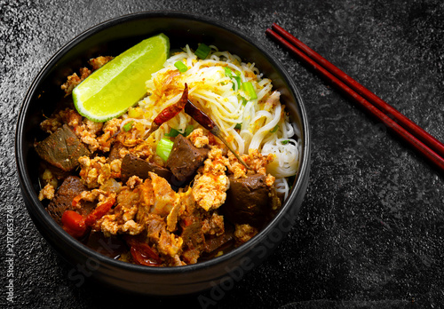 Canvas Print Rice Vermicelli with Northern Thai Curry Sauce (Khanom Chin Nam Ngiao) is a local dish from Northern Thailand