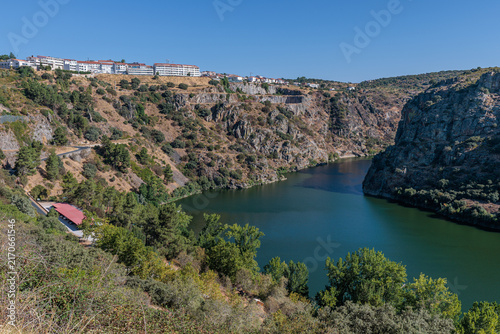 Arribes del Duero and buildings of the Portuguese town of Miranda do Douro, Portugal. Arribes del Duero Natural Park. Duero River.