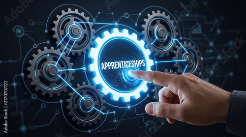 Apprenticeships text on futuristic blue holographic gears interface, finger touching digital network buttons symbolizing future of work, technology and training concept