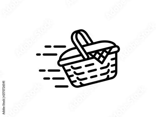 A picnic basket with a checkered cloth moves quickly across a white background symbolizing fast delivery