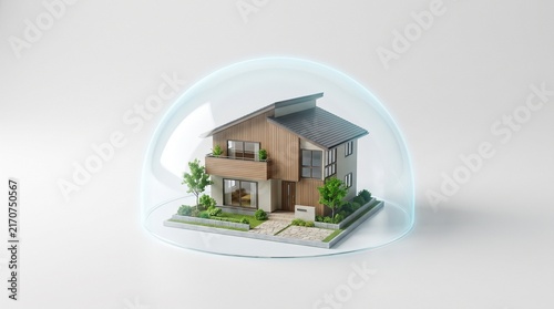 A modern miniature house model protected inside a clear transparent bubble on a white background, symbolizing safety and security.