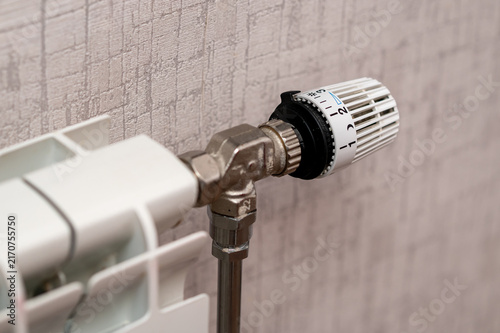 Canvastavla Close Up of White Radiator Thermostatic Valve on a Central Heating System in a M
