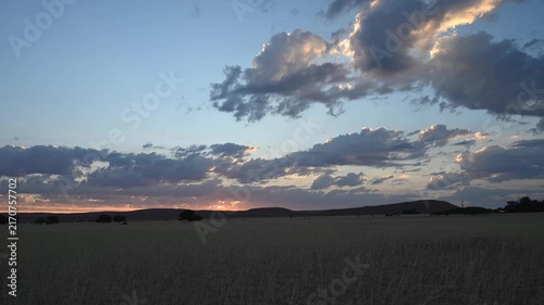 Clouds drift over the Namibian desert, African landscape. Timelapse.