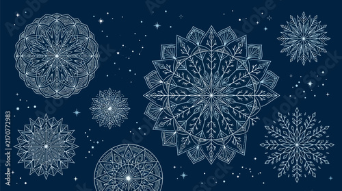 Intricate snowflakes and geometric patterns against a starry night sky