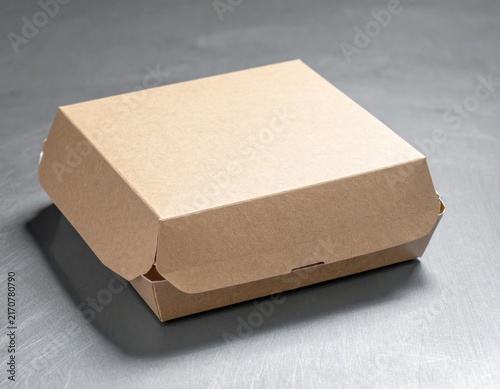 Closed brown kraft paper burger box for takeaway food, eco friendly packaging container, cardboard material