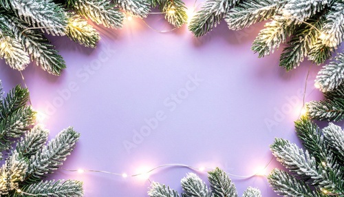 Evergreen branches with festive lights
