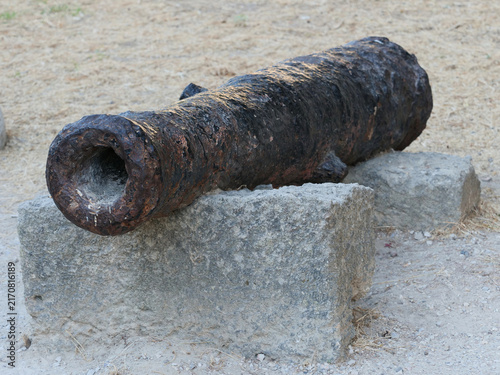 Fotografie Historic, heavily corroded iron smoothbore cannon
