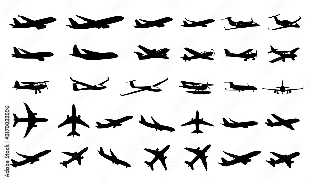 Fototapeta premium Collection of various airplane silhouettes showing different types of aircraft in flight and from multiple angles