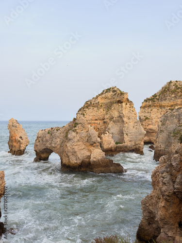 Dramatic coastal rock formations and sea stacks in Algarve