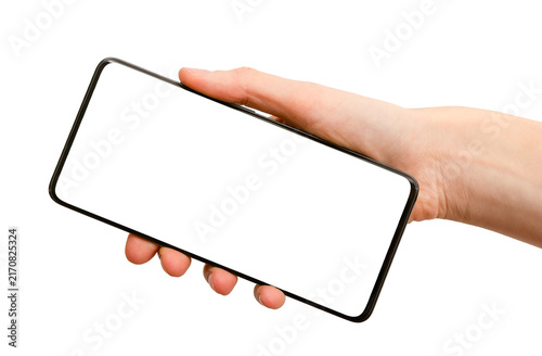 Fotografie Mobile phone in hand horizontal tilted mockup isolated on white background