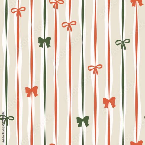 Seamless vector pattern featuring hand-drawn bows tied around long, wavy vertical ribbons in a festive color palette. This whimsical, abstract illustration has a charming hand-painted feel, making it 