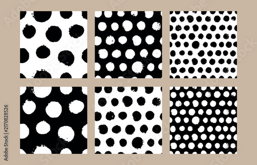 Polka-dot seamless pattern set. Black and white vector wrapping paper with a polka-dot design.