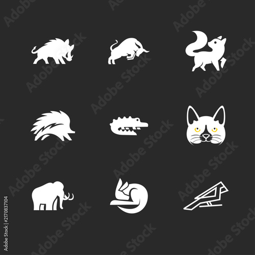 Collection of flat design animal logos and icons. Vector illustrations including wild boar, bull, fox, hedgehog, crocodile, cat, mammoth, kangaroo, and bird in a minimalist style.