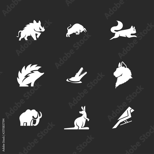 Collection of Flat Design Animal Logos: White Silhouettes of Boar, Bull, Squirrel, Hedgehog, Alligator, Wolf, Mammoth, Kangaroo, and Bird Icons.
