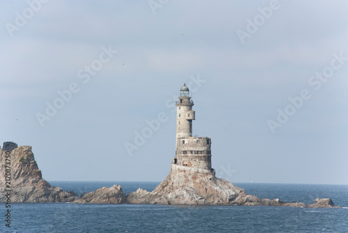 Plakat lighthouse in the sea