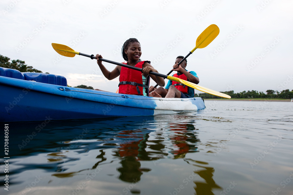 Naklejka premium Joyful kayaking adventure on water