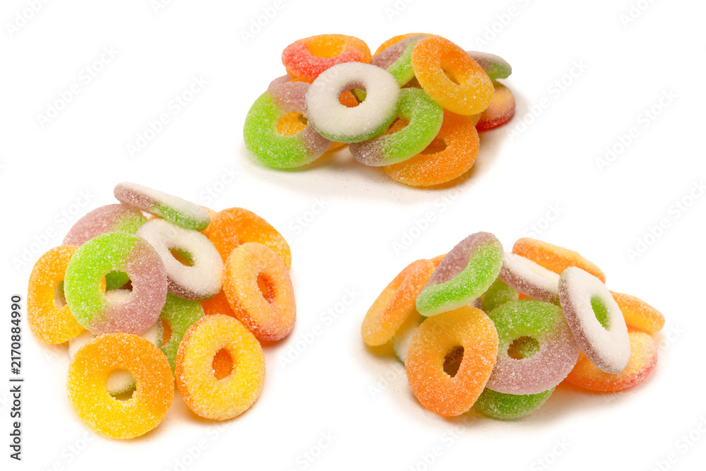 Naklejka premium Assorted gummy candies isolated on a white background. Top view.