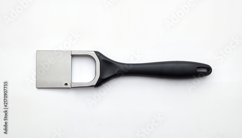 Kitchen tool for slicing cheese against a white background
