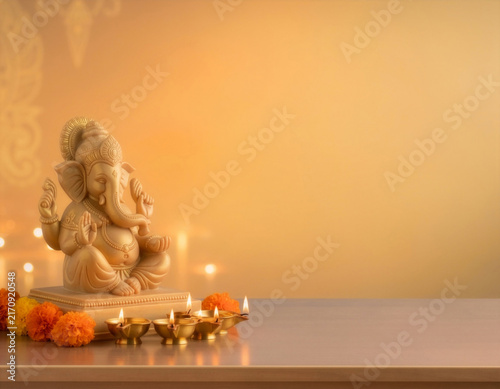 Lord Ganesha Statue With Diyas and Marigolds for Diwali Puja and Hindu Festival Celebration