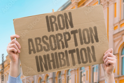 Konstfotografi "Iron absorption inhibition" Iron absorption inhibition and increased anemia risk especially with meals
