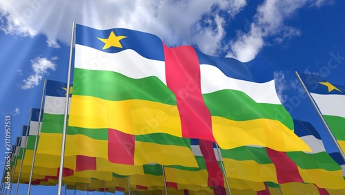 Multiple Central African Republic flags waving on blue sky